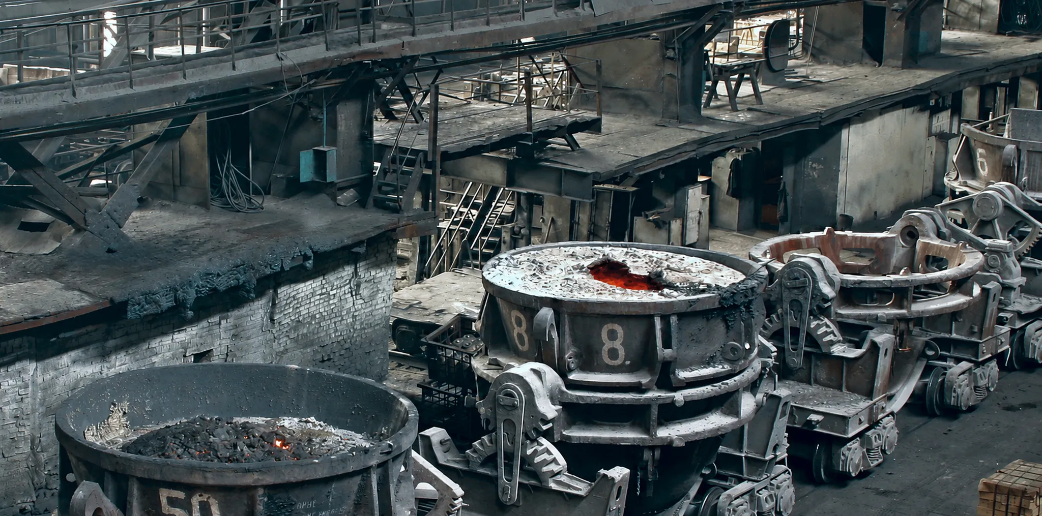 The casting floor of the old works — ladle №8 holding its last heat
